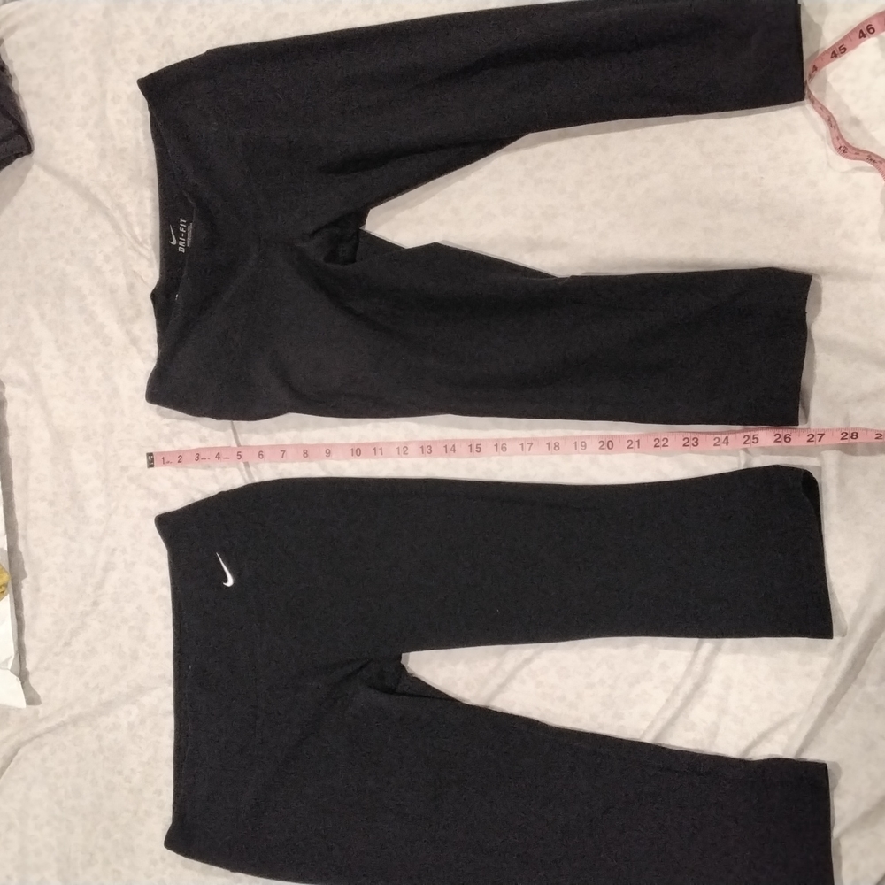 2 black Nike leggings